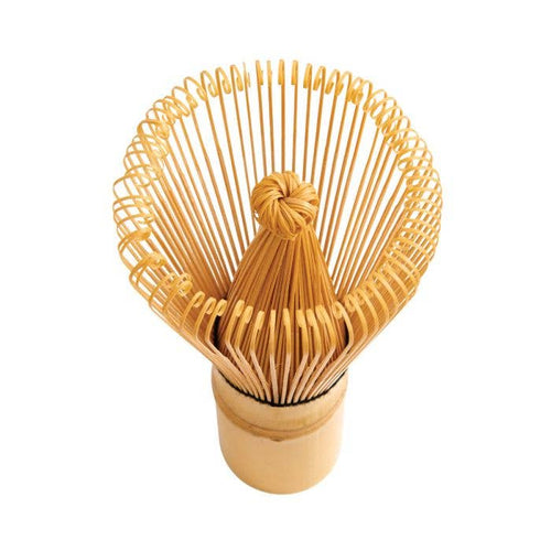 Wooden tea whisk with a handle on a white background