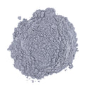 A mound of powdered blue raspberry matcha on a white background.