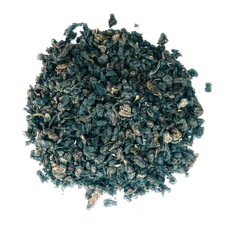 Brown rolled tea on a white background