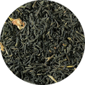 Close-up of green Jasmine tea leaves in a circular arrangement