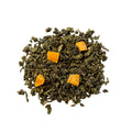 Green oolong tea with mango pieces scattered throughout