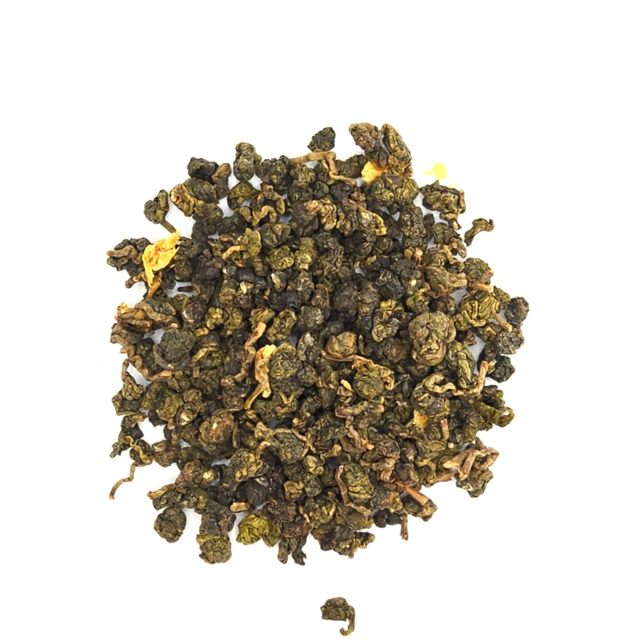 Dry balled oolong tea leaves on a white background